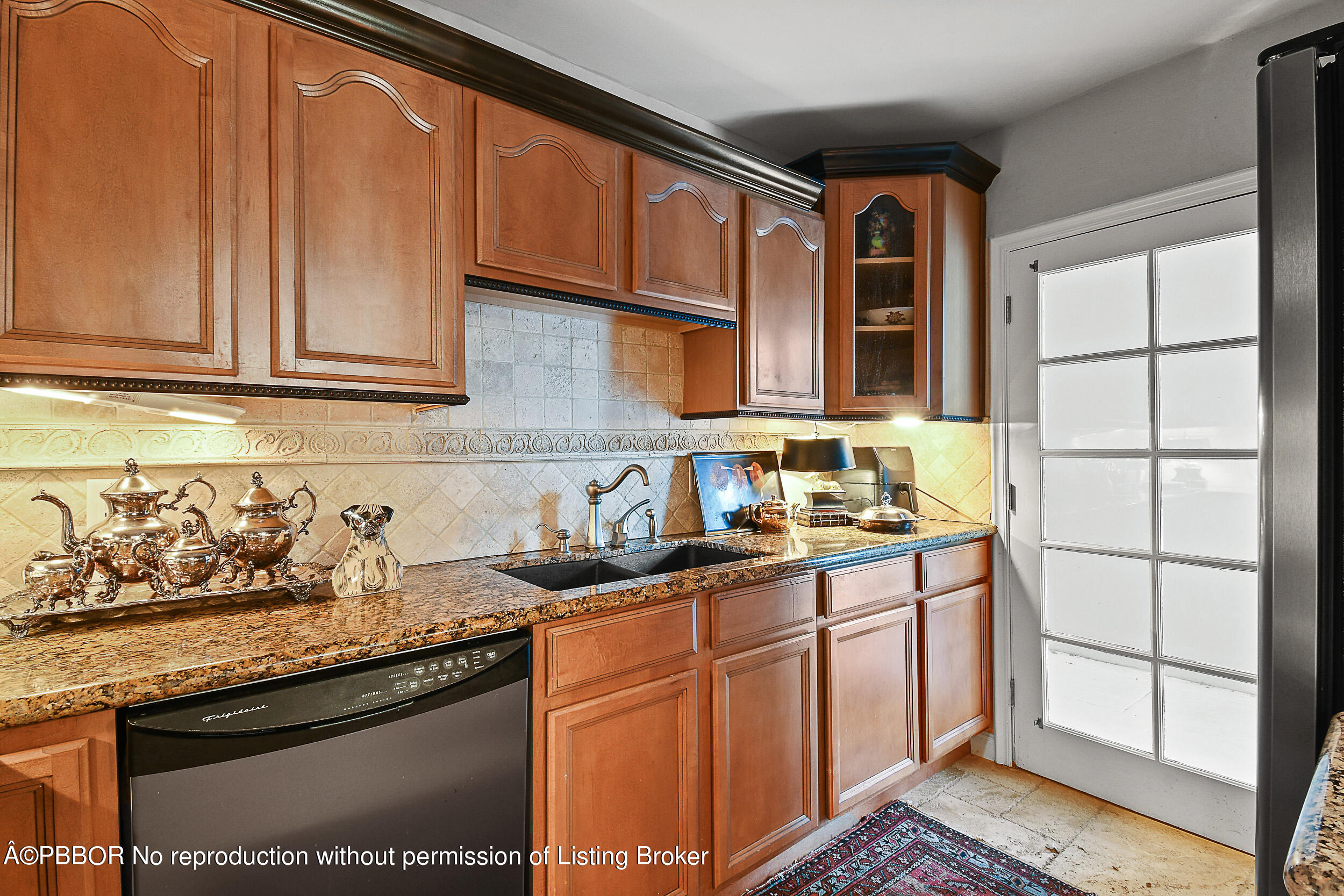 2170 Ibis Isle Road, Unit 2 Palm Beach, FL 33480 - Photo 17 of 38 a kitchen with stainless steel appliances granite countertop a sink stove and cabinets