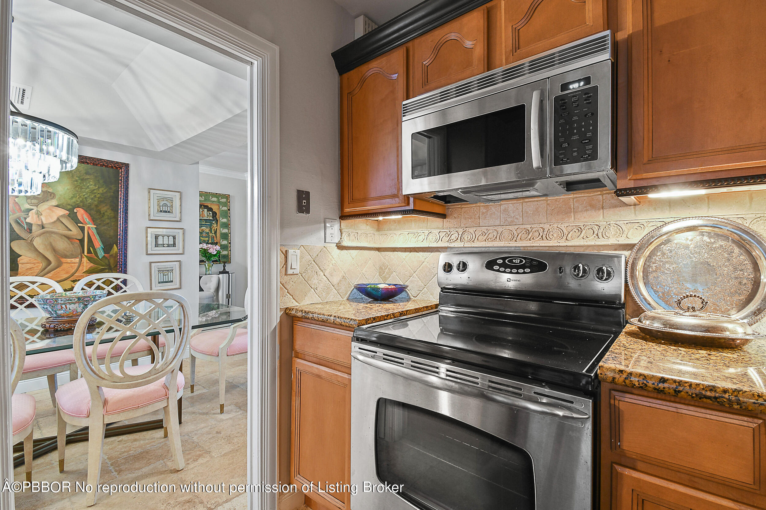 2170 Ibis Isle Road, Unit 2 Palm Beach, FL 33480 - Photo 18 of 38 a stove top oven sitting inside of a kitchen