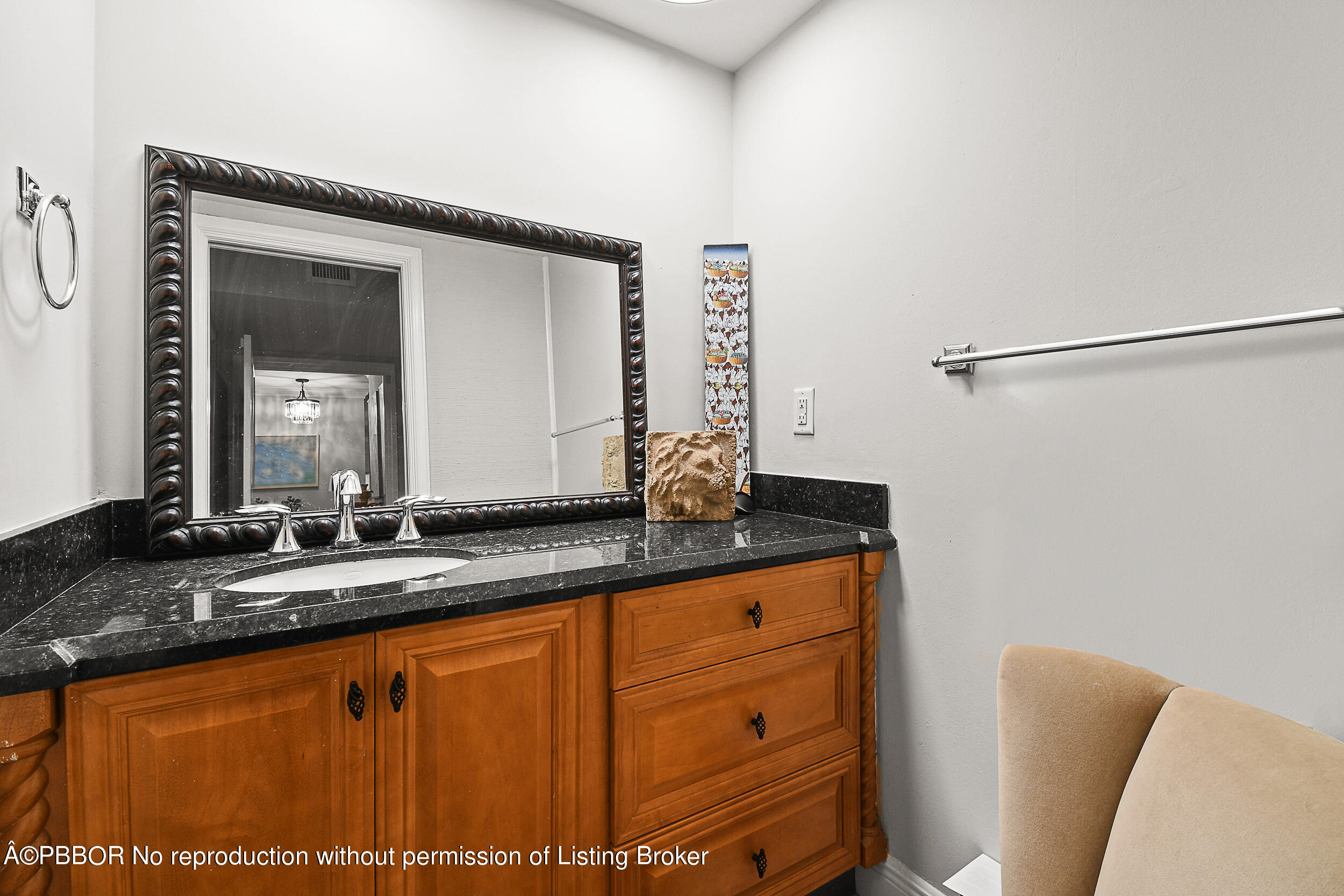 2170 Ibis Isle Road, Unit 2 Palm Beach, FL 33480 - Photo 21 of 38 a bathroom with a granite countertop sink and a mirror
