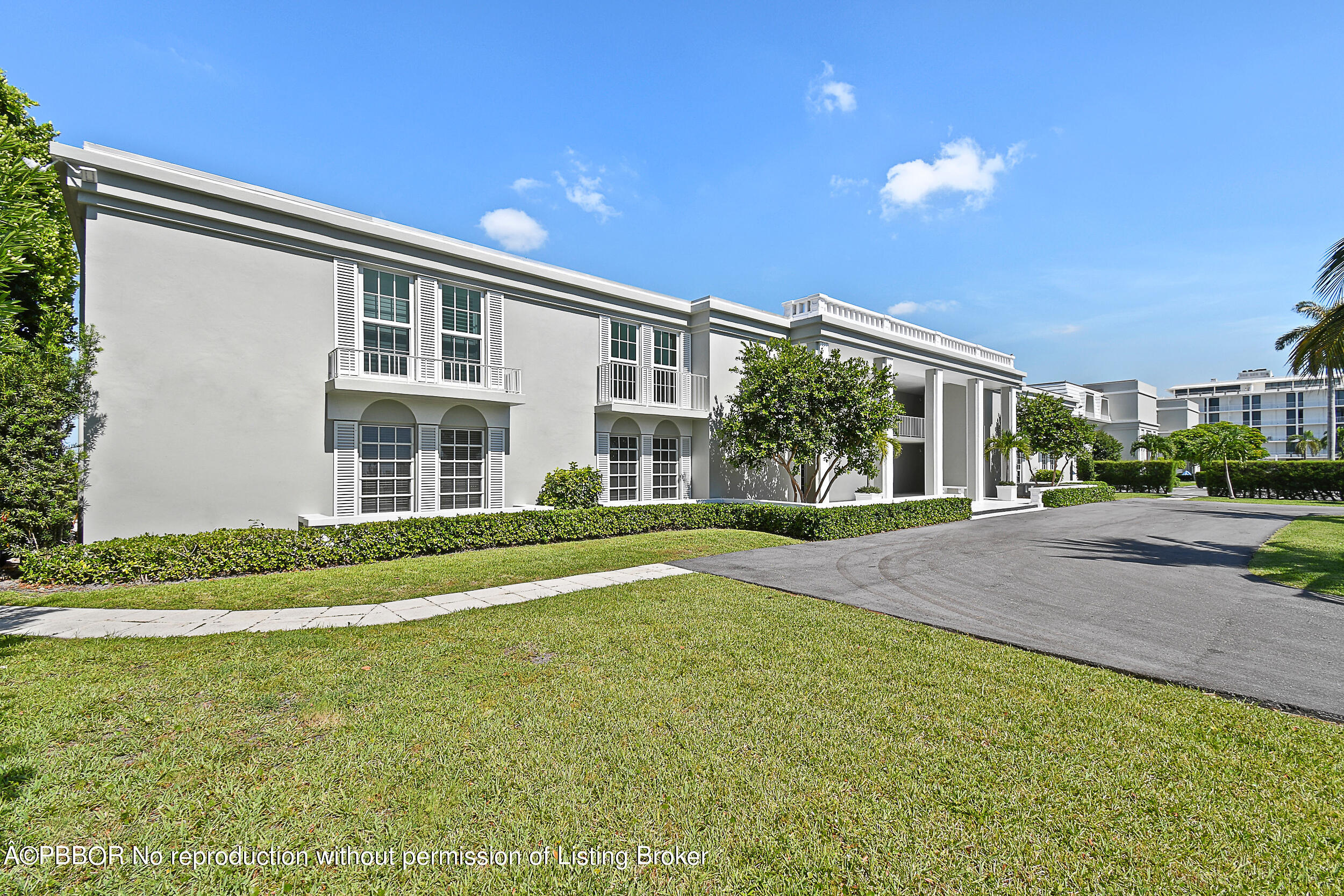 2170 Ibis Isle Road, Unit 2 Palm Beach, FL 33480 - Photo 22 of 38 a front view of a house with a yard