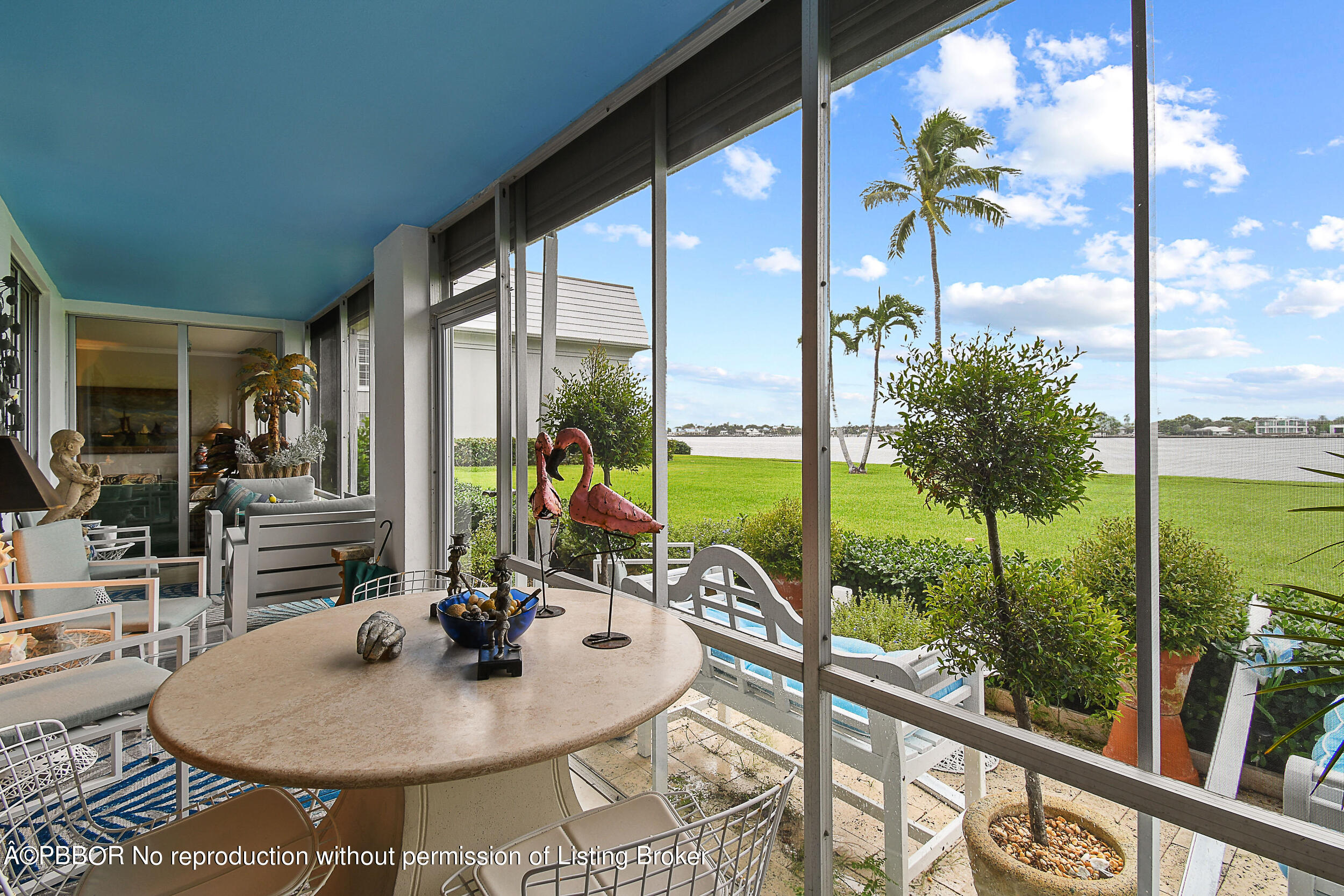 2170 Ibis Isle Road, Unit 2 Palm Beach, FL 33480 - Photo 5 of 38 a dining room with furniture water view and a floor to ceiling window