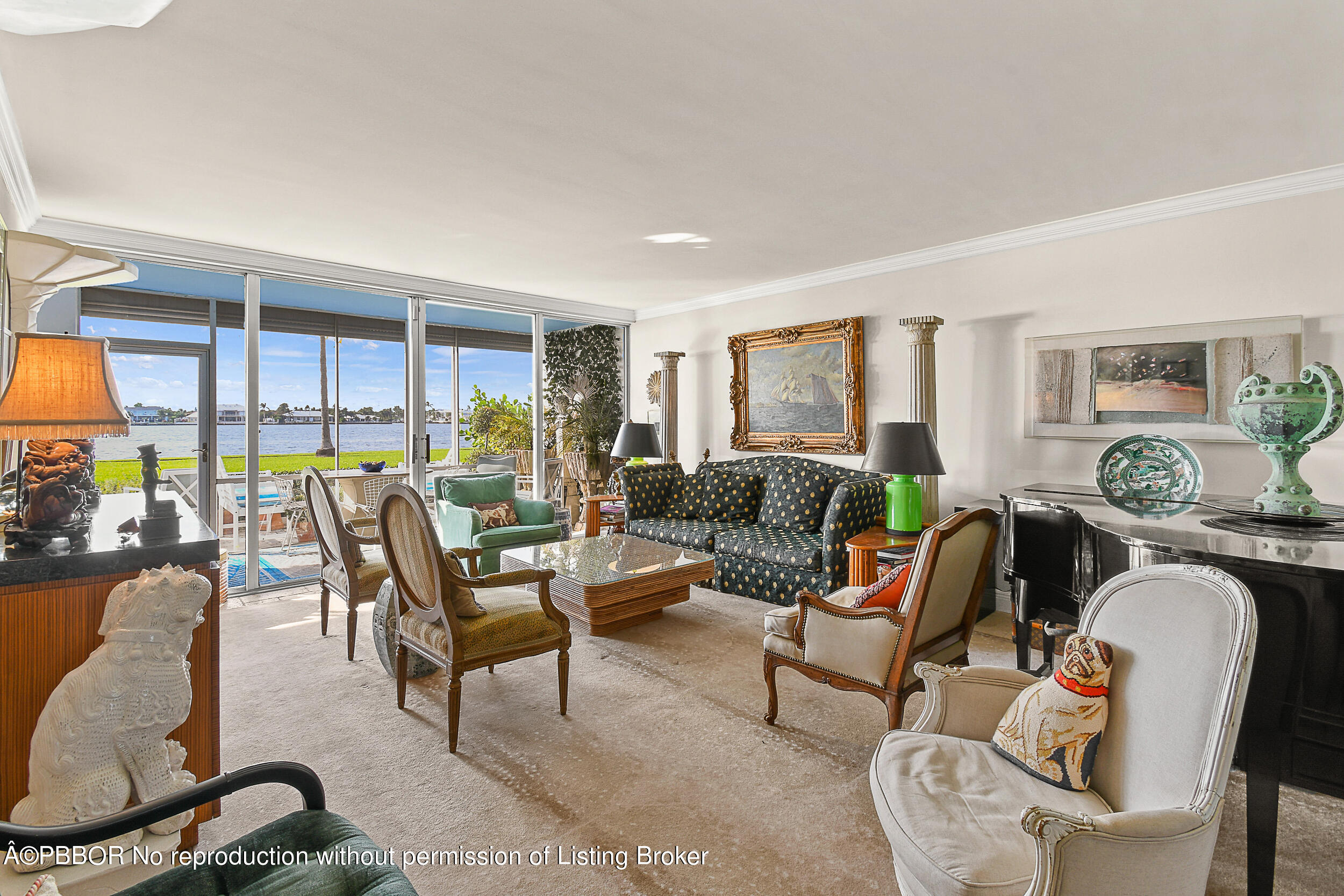2170 Ibis Isle Road, Unit 2 Palm Beach, FL 33480 - Photo 6 of 38 a living room with furniture and a large window
