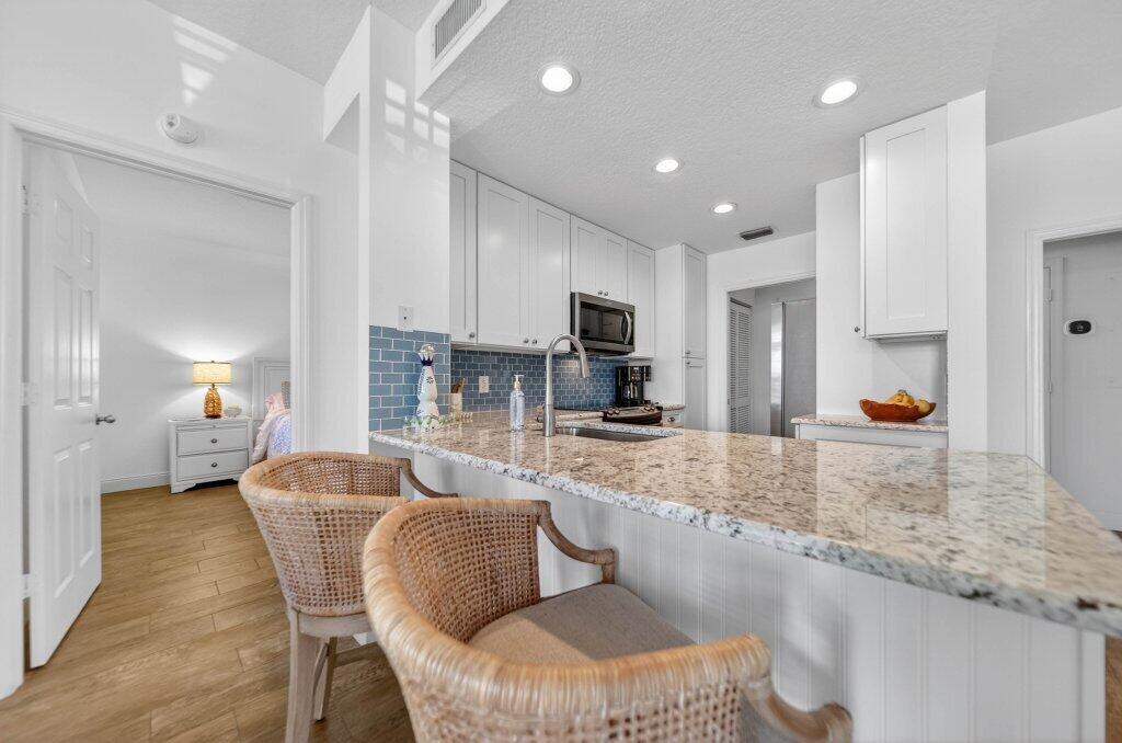 391 Northeast Plantation Road, Unit 215 Jensen Beach, FL 34957 - Photo 5 of 20 kitchen2.jpg-SMALL