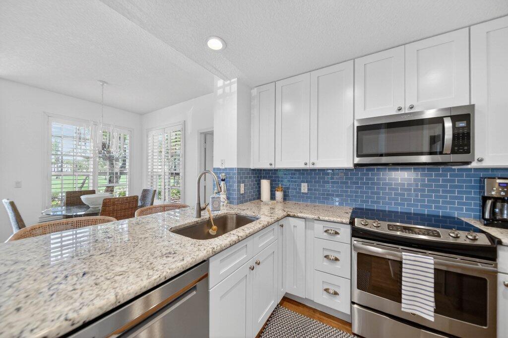 391 Northeast Plantation Road, Unit 215 Jensen Beach, FL 34957 - Photo 7 of 20 kitchen4.jpg-SMALL