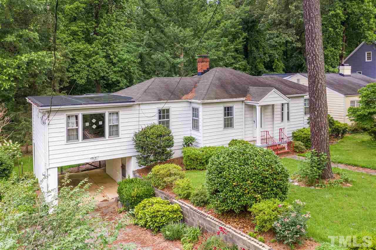 925 Marilyn Drive Raleigh, NC 27607 - Photo 1 of 13 a house that has a lot of plants in it