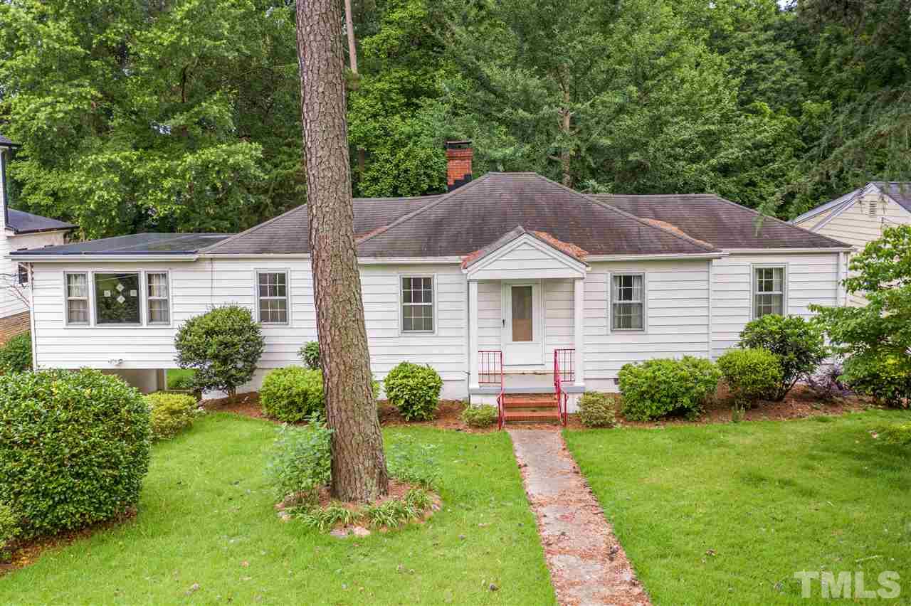 925 Marilyn Drive Raleigh, NC 27607 - Photo 2 of 13 a aerial view of a house with a yard and plants