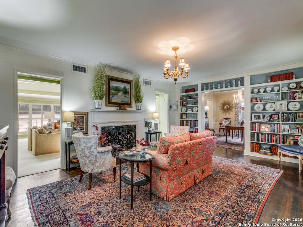 316 Elizabeth Road Terrell Hills, TX 78209 - Photo 5 of 25 a living room with furniture and a fireplace