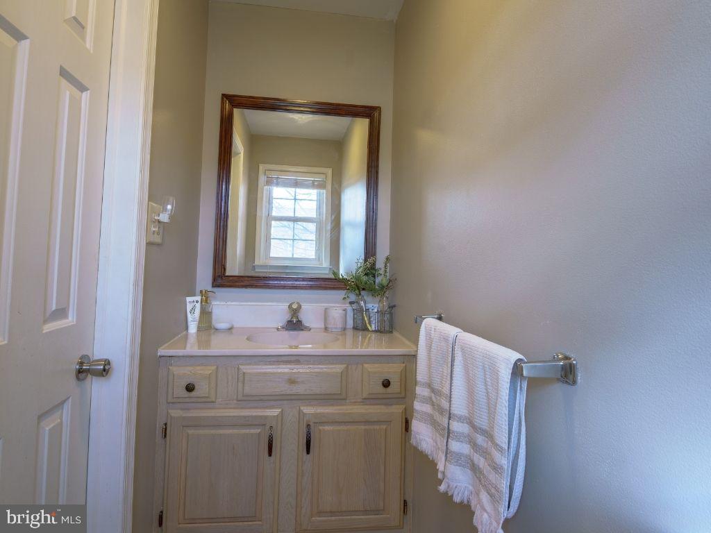 2014 Ryans Run Lansdale, PA 19446 - Photo 12 of 36 a bathroom with a sink vanity and a mirror