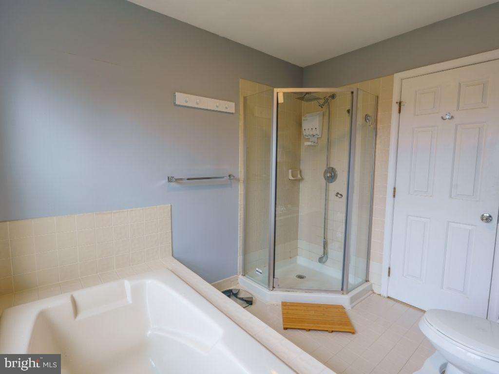 2014 Ryans Run Lansdale, PA 19446 - Photo 16 of 36 a bathroom with a tub and shower