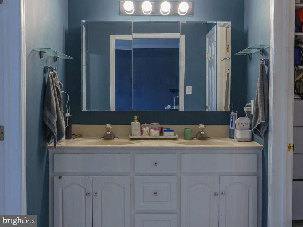 2014 Ryans Run Lansdale, PA 19446 - Photo 23 of 36 a bathroom with a sink and a mirror