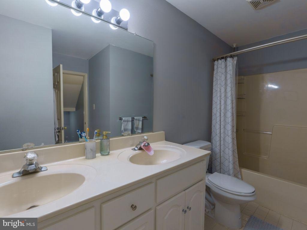 2014 Ryans Run Lansdale, PA 19446 - Photo 24 of 36 a bathroom with a sink and a mirror