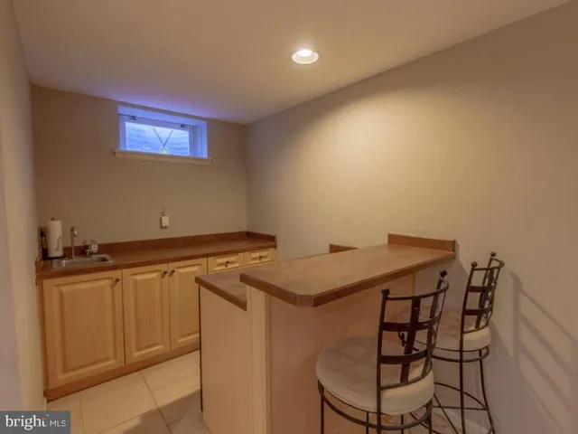 a room with a table and chairs