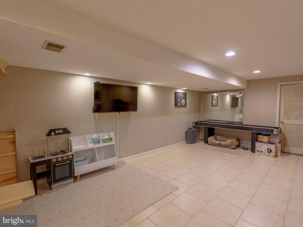 2014 Ryans Run Lansdale, PA 19446 - Photo 30 of 36 a room with furniture and a flat screen tv