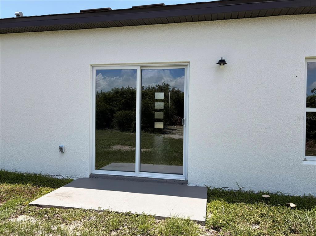14142 Appleton Boulevard Port Charlotte, FL 33981 - Photo 24 of 26 a view of backyard with green space