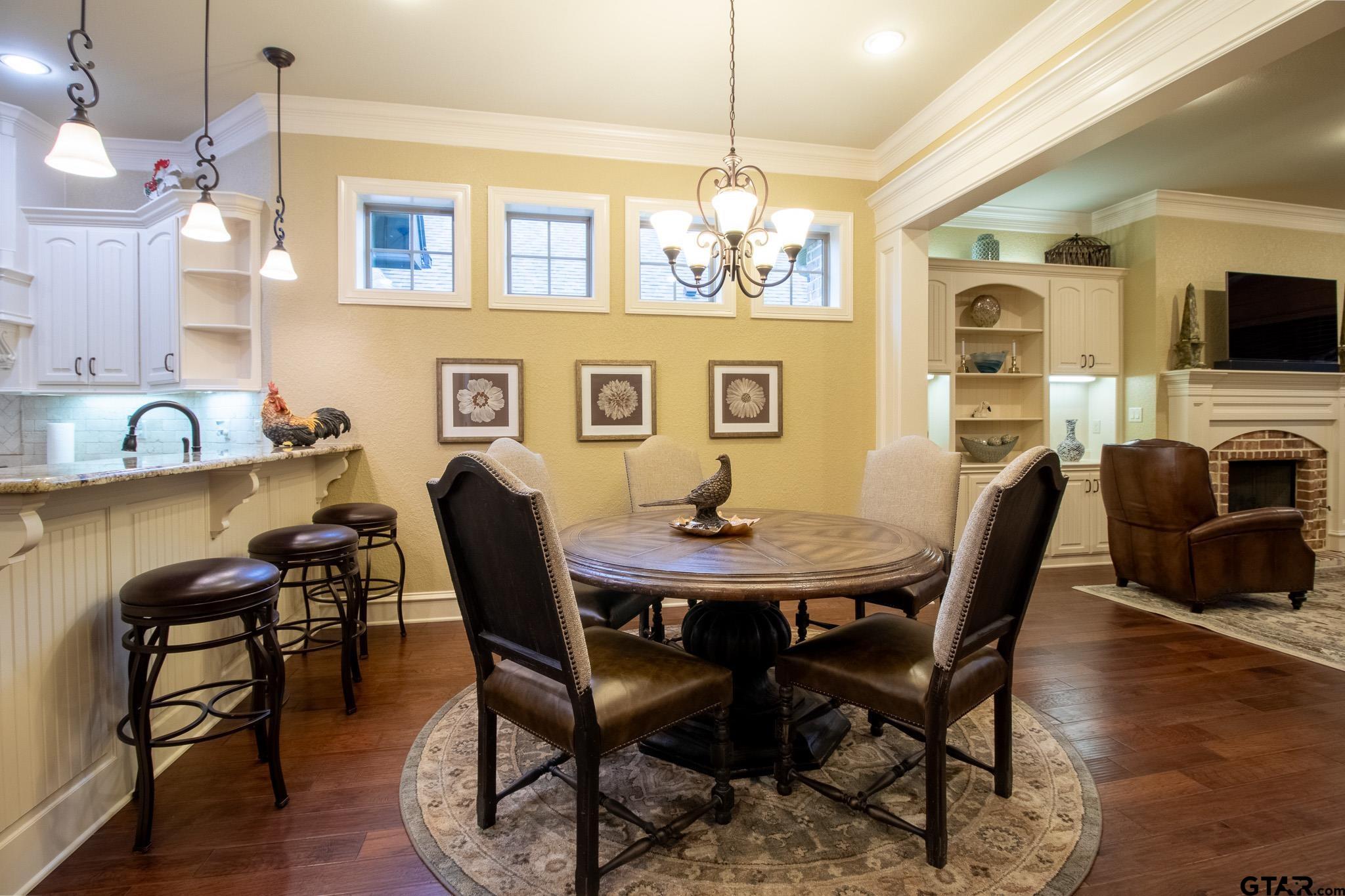 7315 Princedale Tyler, TX 75703 - Photo 7 of 25 a view of a dining room with furniture and wooden floor