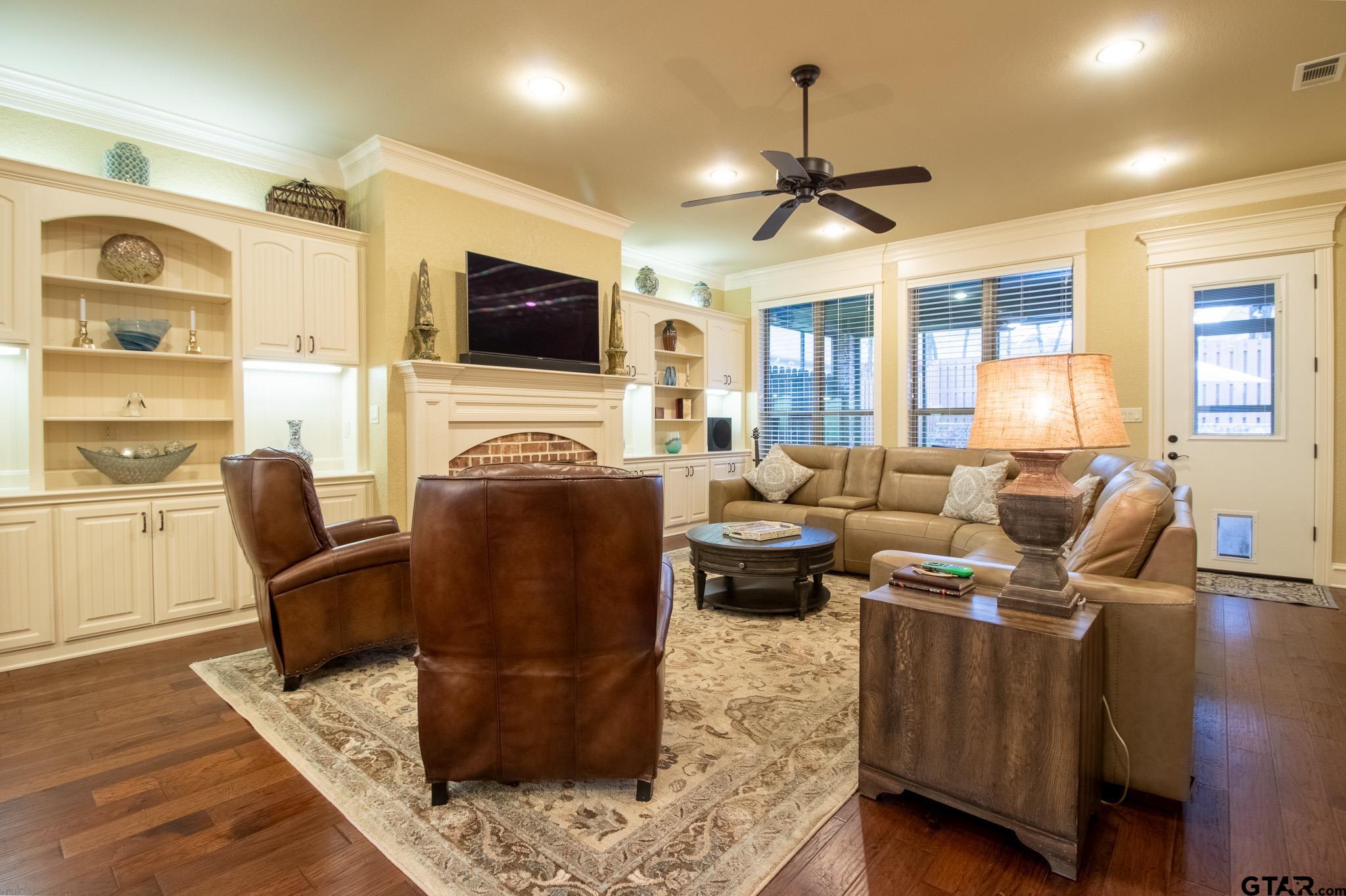 7315 Princedale Tyler, TX 75703 - Photo 8 of 25 a living room with furniture fireplace and flat screen tv