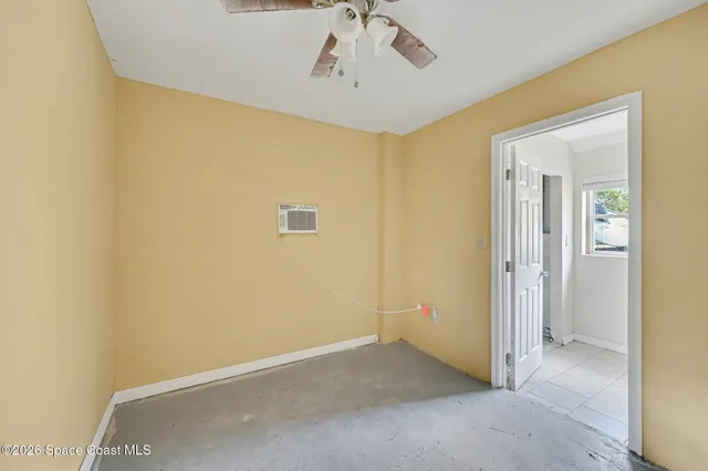 a view of a hallway with a chandelier