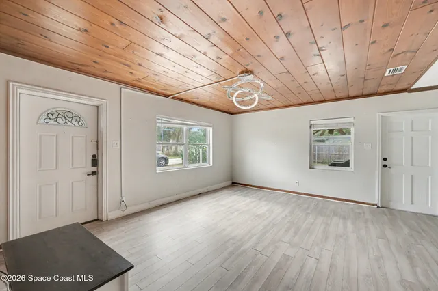 an empty room with windows