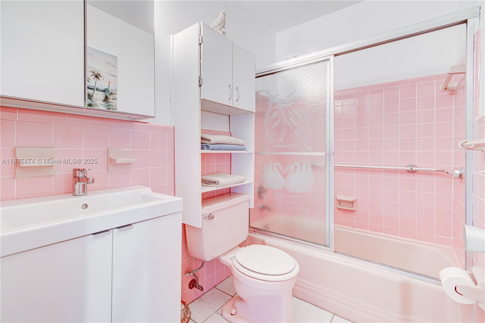 800 Southwest 10th Terrace, Unit 20T Hallandale Beach, FL 33009 - Photo 11 of 28 a bathroom with a sink toilet and shower