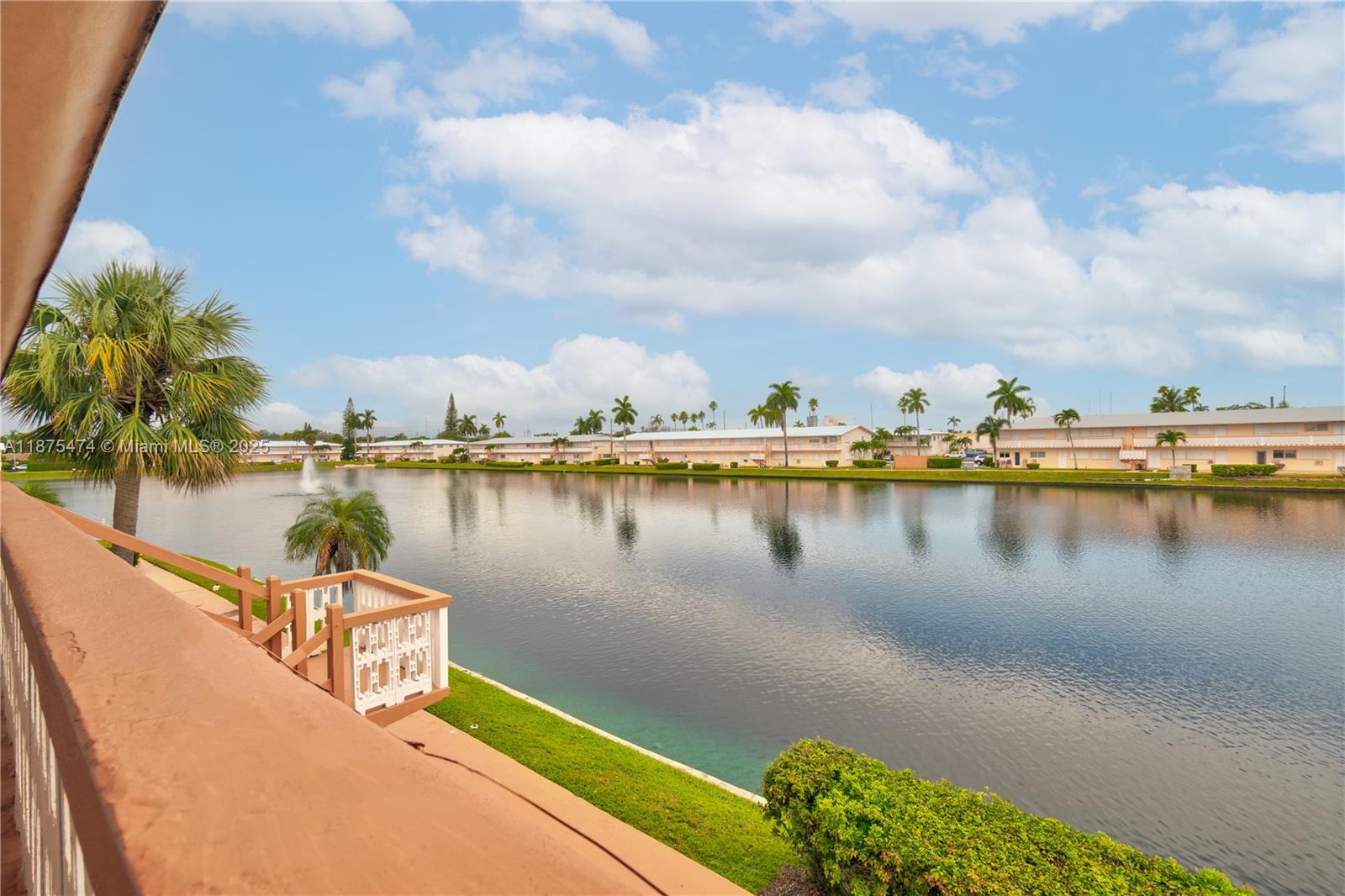 800 Southwest 10th Terrace, Unit 20T Hallandale Beach, FL 33009 - Photo 19 of 28 a view of a lake with houses in the back