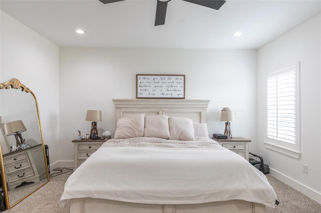 143 Purcell Lane Tuscola, TX 79562 - Photo 18 of 35 a bedroom with a large bed and a tv