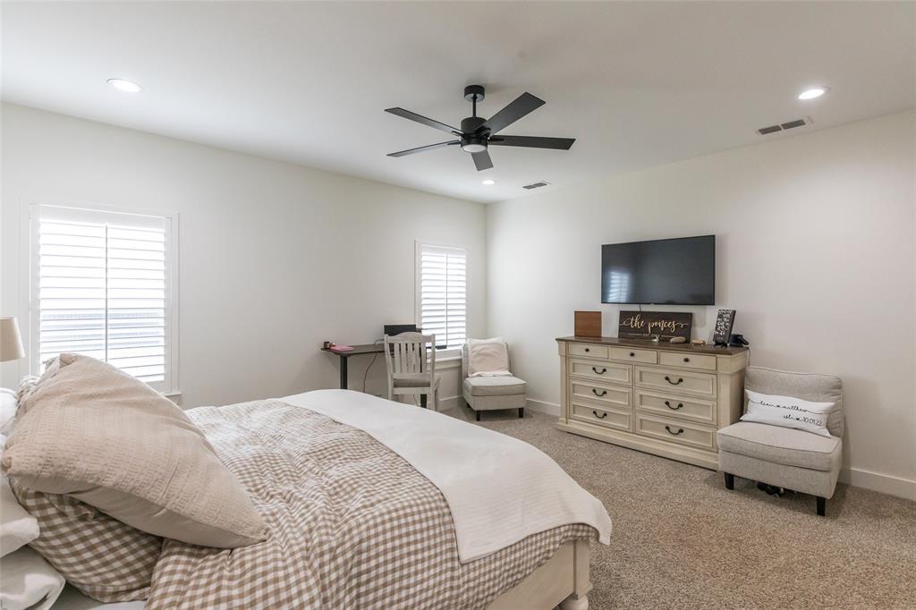 143 Purcell Lane Tuscola, TX 79562 - Photo 19 of 35 a bedroom with a bed and a flat screen tv