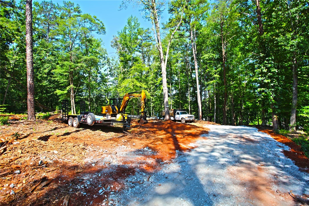 1359 Hbr Rdg Road Seneca, SC 29672 - Photo 14 of 39 A spacious, wooded lot awaits your custom home vision, featuring a partially cleared building site.