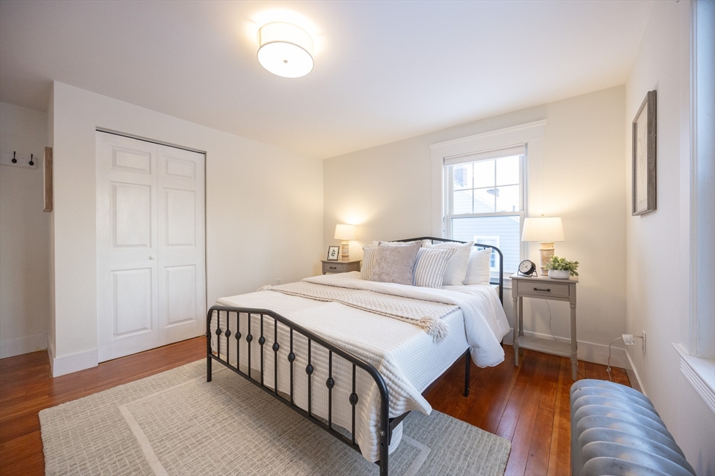 42 York Street Andover, MA 01810 - Photo 18 of 35 a bedroom with a bed and a window