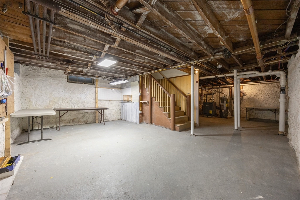 42 York Street Andover, MA 01810 - Photo 28 of 35 a view of empty room with wooden ceiling