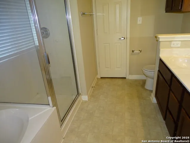 a view of bathroom with a sink and a toilet