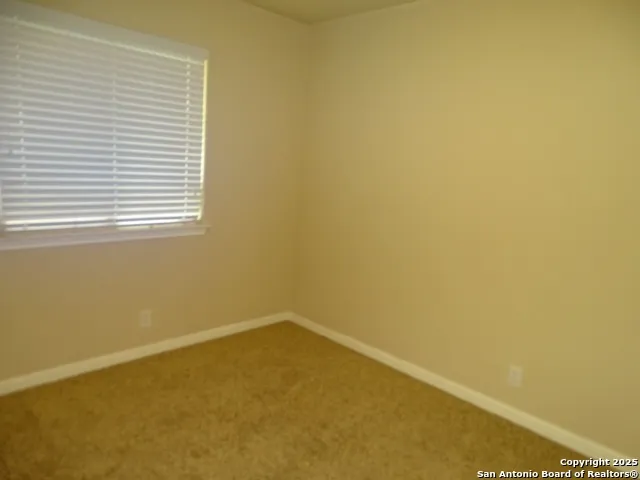 a view of a small space with a window