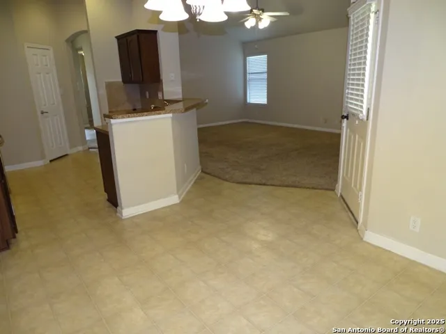 a view of kitchen and utility room