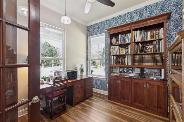 a room with furniture window and book shelf