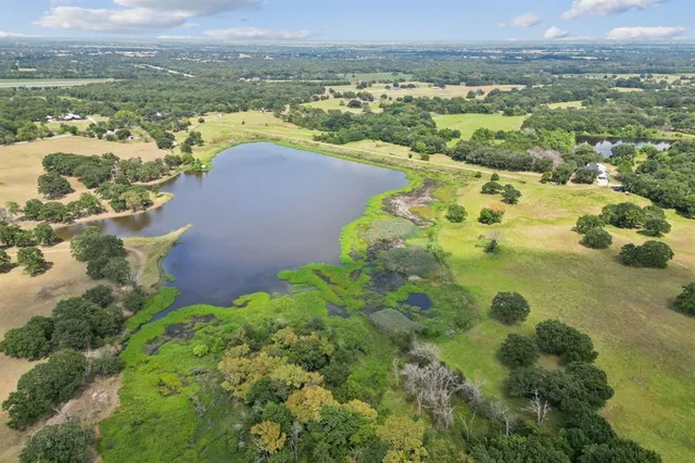 a view of a lake with a city view