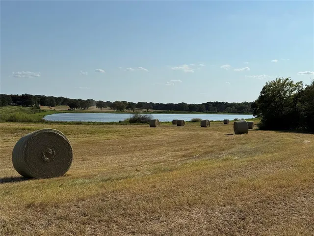 a view of a lake with a big yard