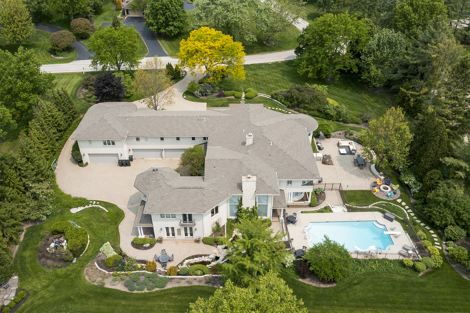 1877 Banbury Road Inverness, IL 60067 - Photo 1 of 59 an aerial view of a house with garden space ocean view