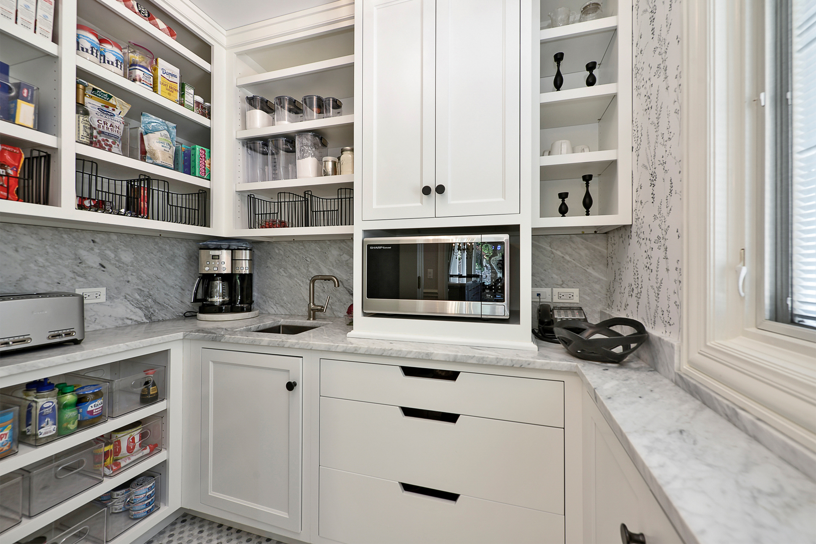 1877 Banbury Road Inverness, IL 60067 - Photo 13 of 59 a kitchen with stainless steel appliances a cabinets and a window