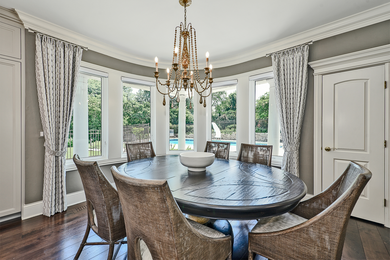 1877 Banbury Road Inverness, IL 60067 - Photo 15 of 59 a view of a dining room with furniture window and wooden floor