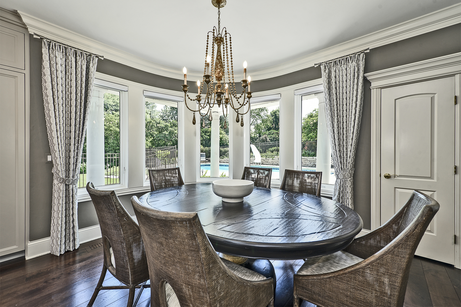 1877 Banbury Road Inverness, IL 60067 - Photo 15 of 59 a view of a dining room with furniture window and wooden floor