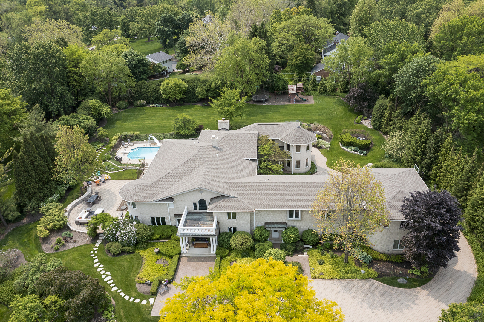 1877 Banbury Road Inverness, IL 60067 - Photo 2 of 59 an aerial view of a house with garden space and street view