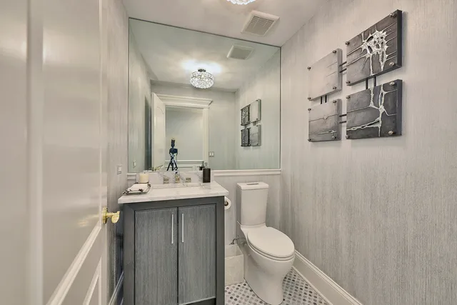 a spacious bedroom with a bed and a table