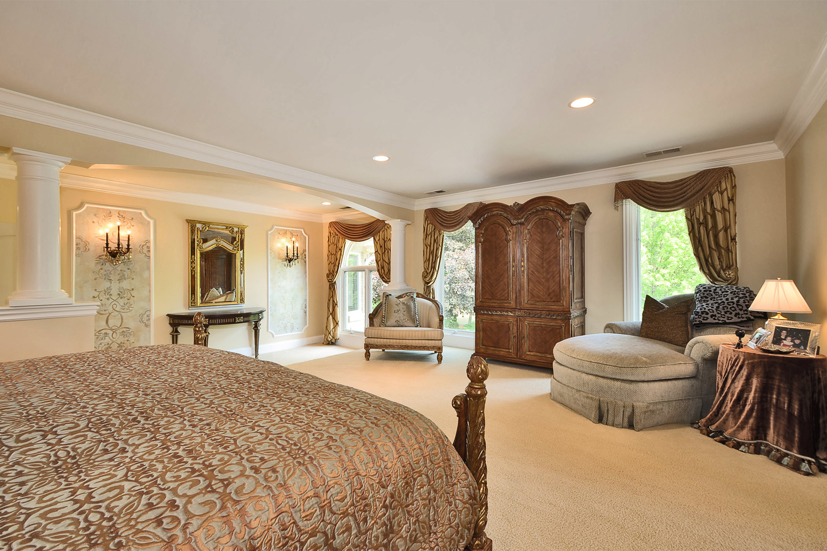 1877 Banbury Road Inverness, IL 60067 - Photo 29 of 59 a spacious bedroom with a balcony a large bed and a large window