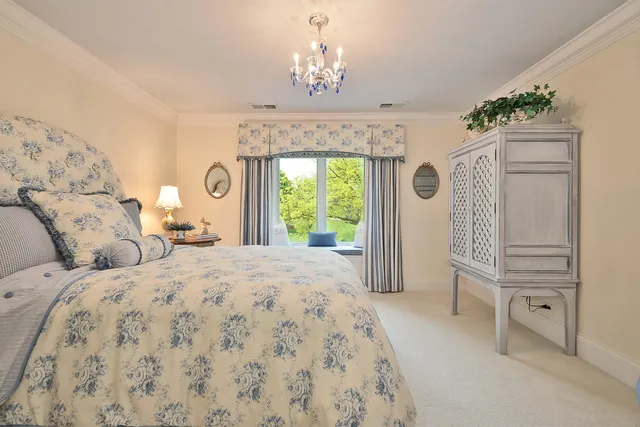 a view of a chairs with a backyard