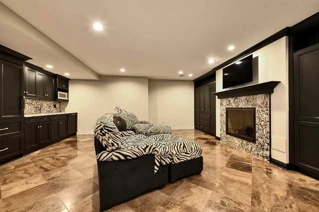 a view of a house with a backyard porch and sitting area