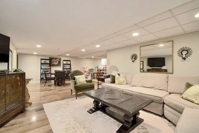 an aerial view of a house with a garden