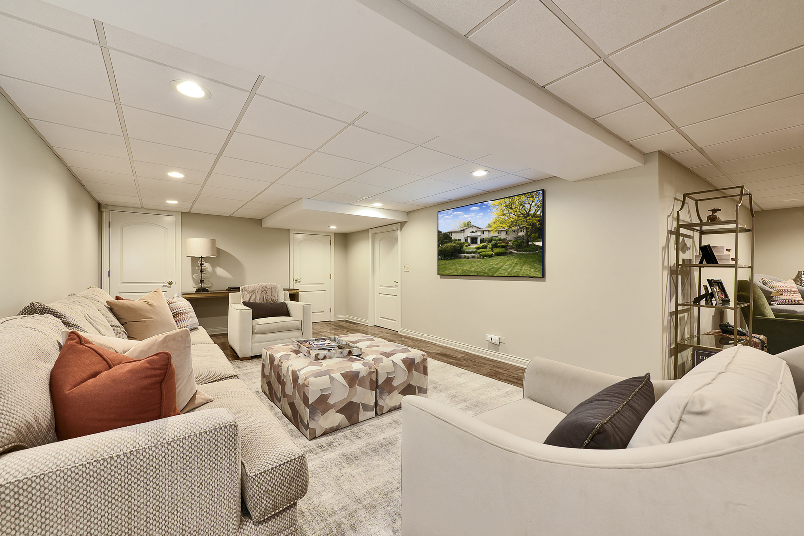 1877 Banbury Road Inverness, IL 60067 - Photo 41 of 59 a living room with furniture and a flat screen tv