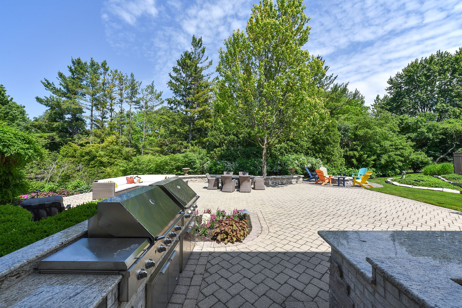 1877 Banbury Road Inverness, IL 60067 - Photo 45 of 59 an outdoor sitting area with furniture and a yard