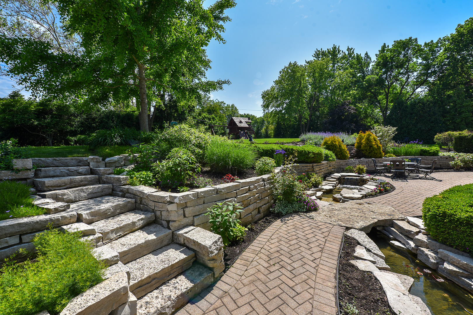 1877 Banbury Road Inverness, IL 60067 - Photo 51 of 59 a view of a garden with patio