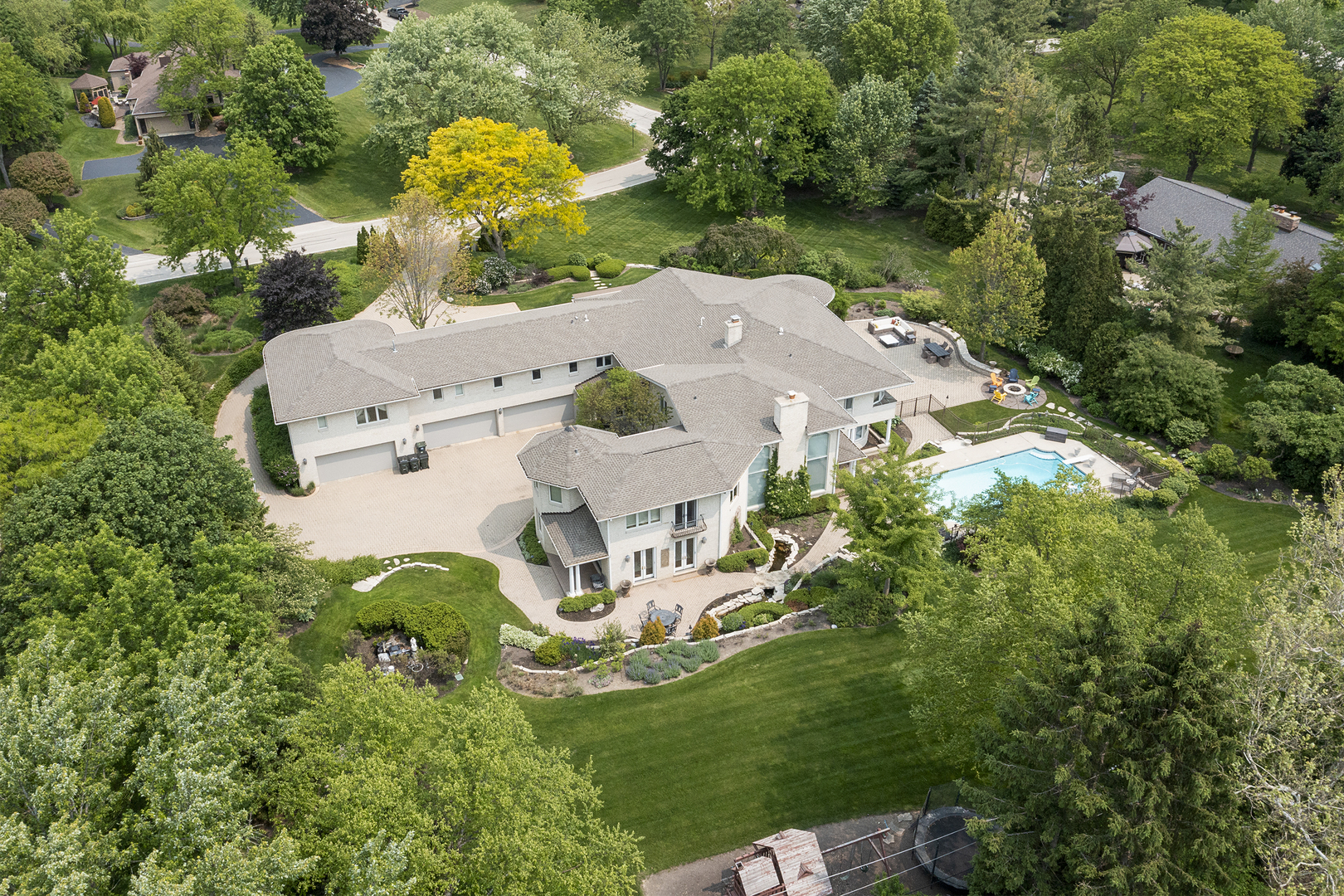 1877 Banbury Road Inverness, IL 60067 - Photo 58 of 59 an aerial view of a house with swimming pool outdoor seating and yard