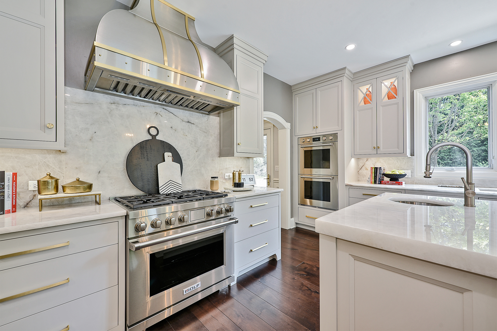 1877 Banbury Road Inverness, IL 60067 - Photo 10 of 59 a kitchen with stainless steel appliances granite countertop a stove and a sink
